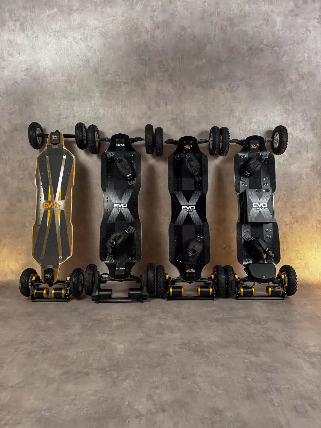 The 4 electric skateboards of the new Evo-Spirit 2026 range aligned in the studio