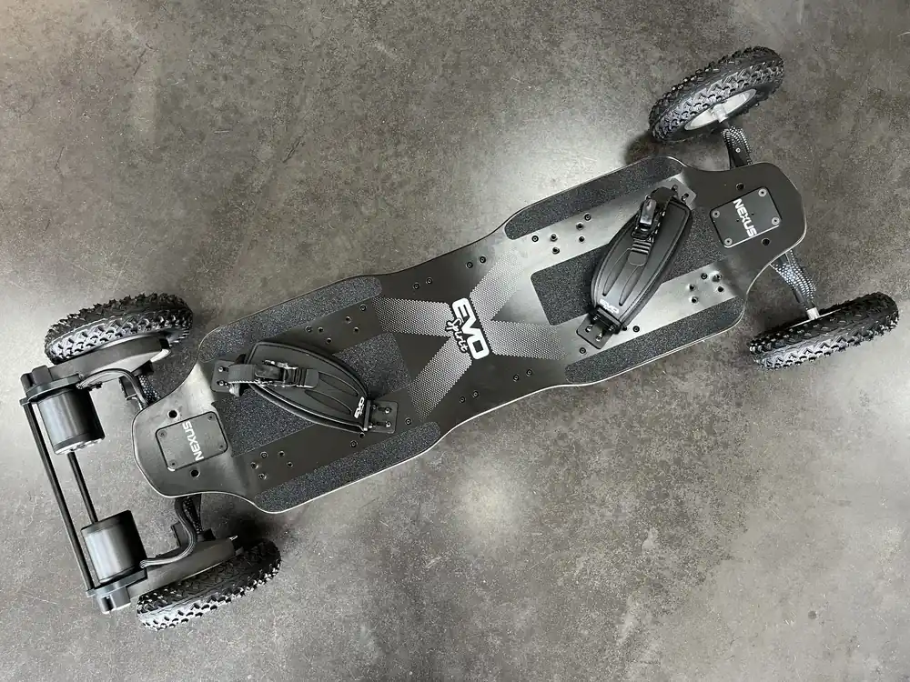 NEXUS 2026 Evo-Spirit electric mountainboard by a pond